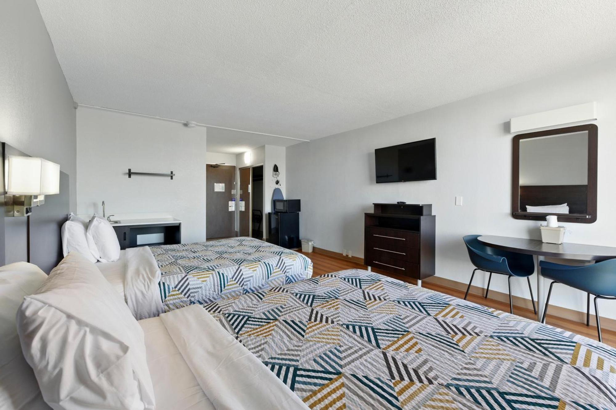Kamer met 2 Queensize Bedden - Rookvrij